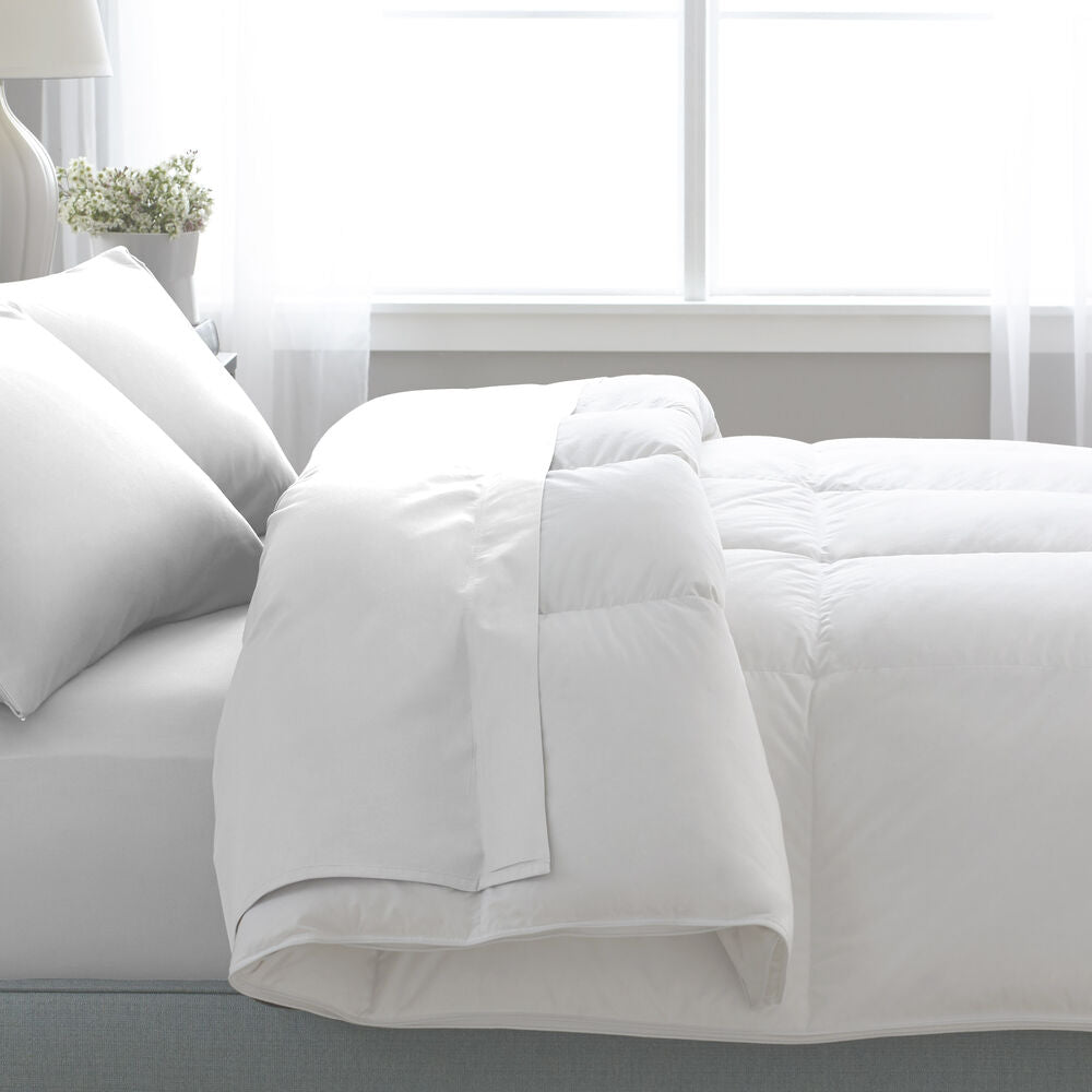 White Down Alternative Comforter on a bed in a bright bedroom