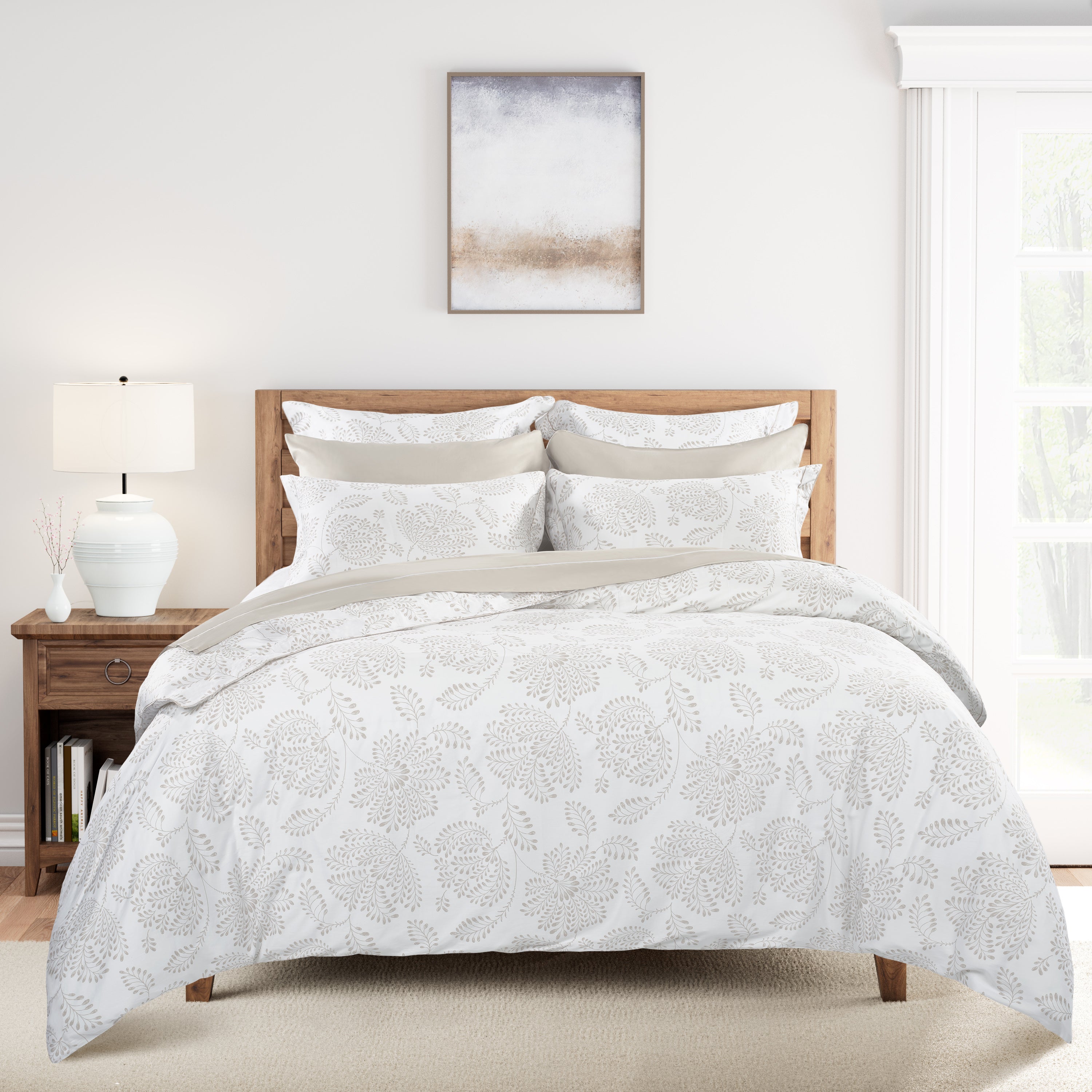 Bed with Pumice patterned comforter in a bedroom setting