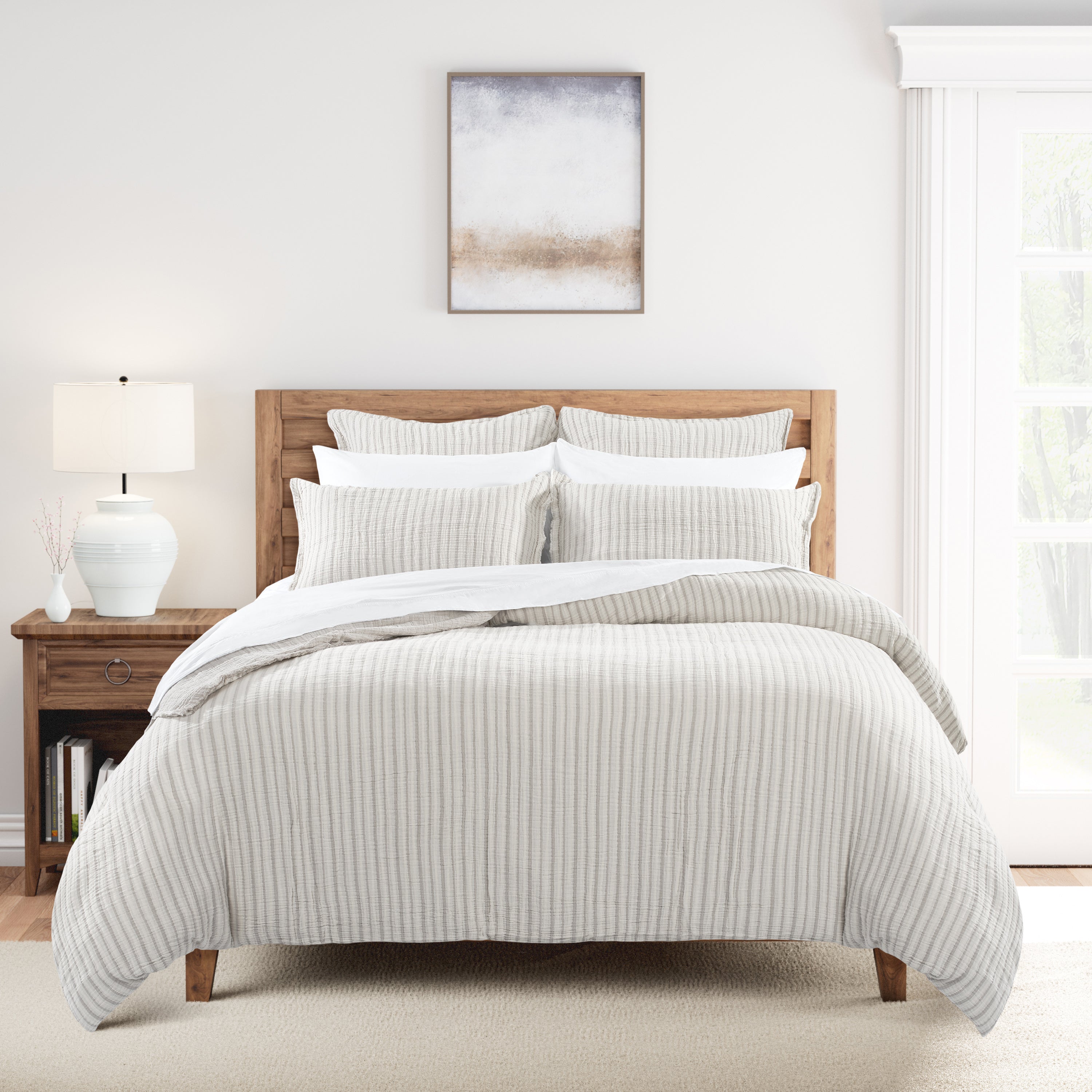 Neatly made bed with Lunar Rock Gauze Duvet Set