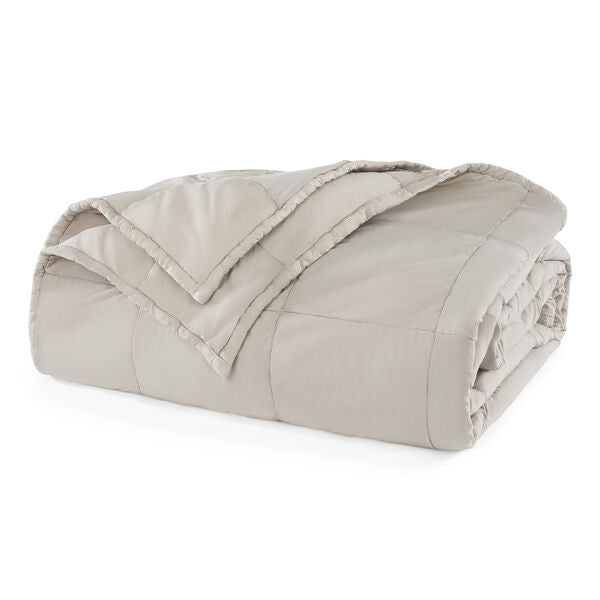 Folded Lunar Rock comforter on a white background