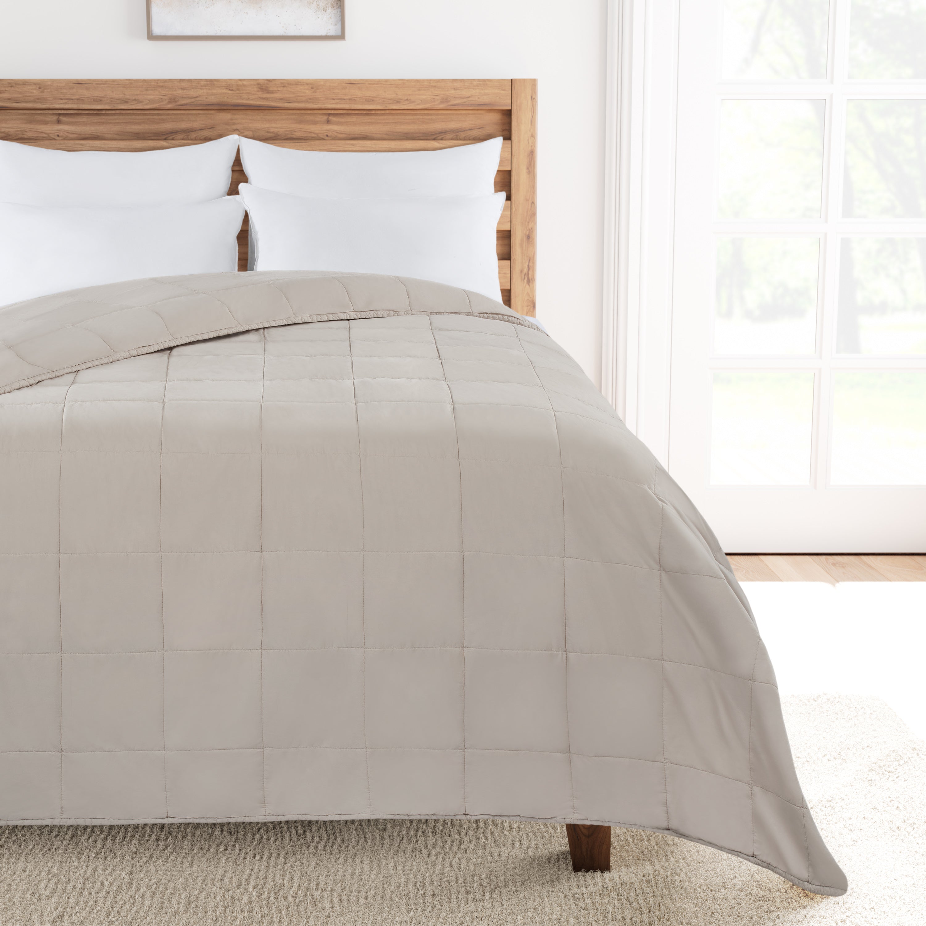 Lunar Rock comforter on a bed in a bright bedroom