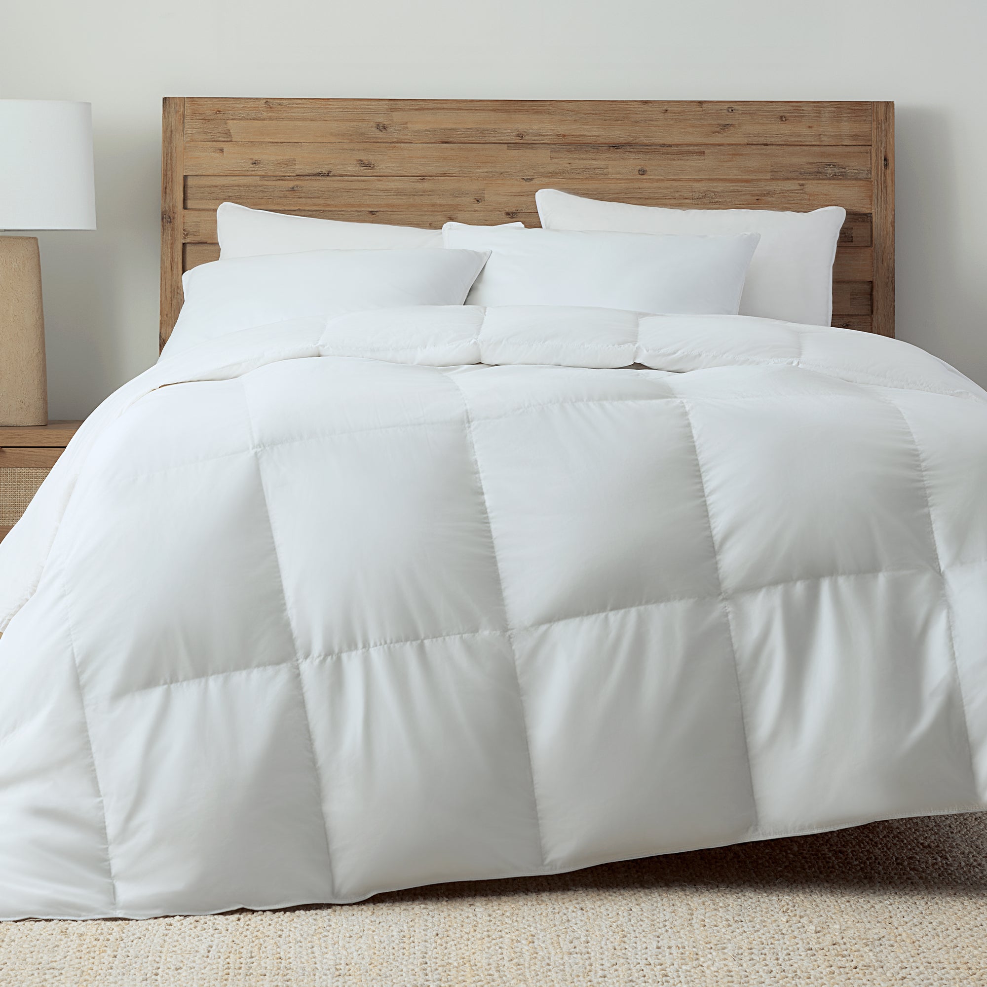 Down Alternative Collection Image of Products on a bed. 