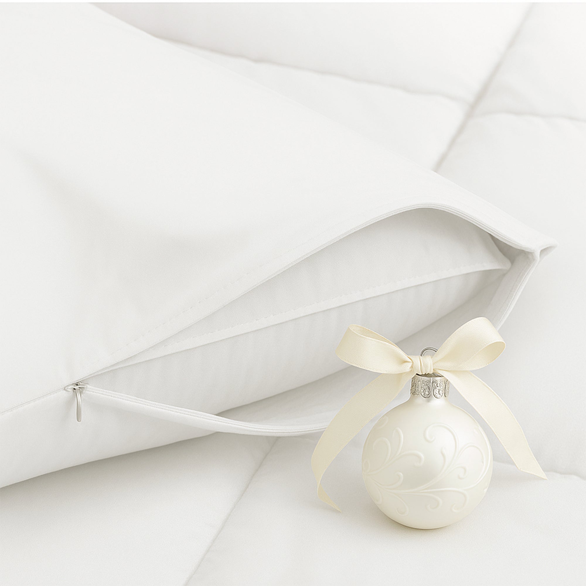 Pillow protector on a pillow with a christmas decoration