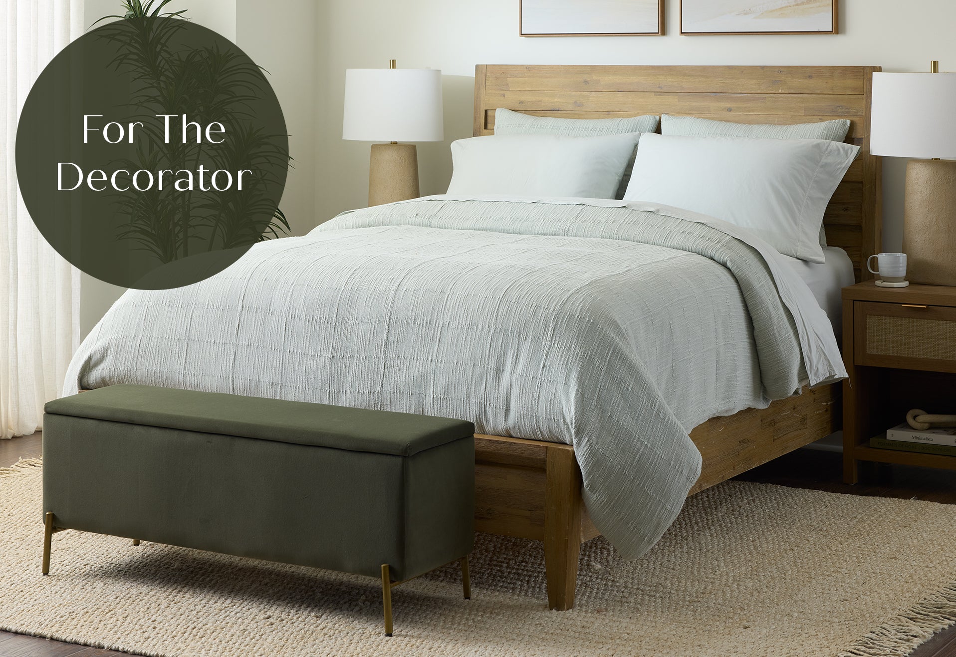 Bedroom with wooden bed, white bedding, and green bench, labeled 'For The Decorator'.
