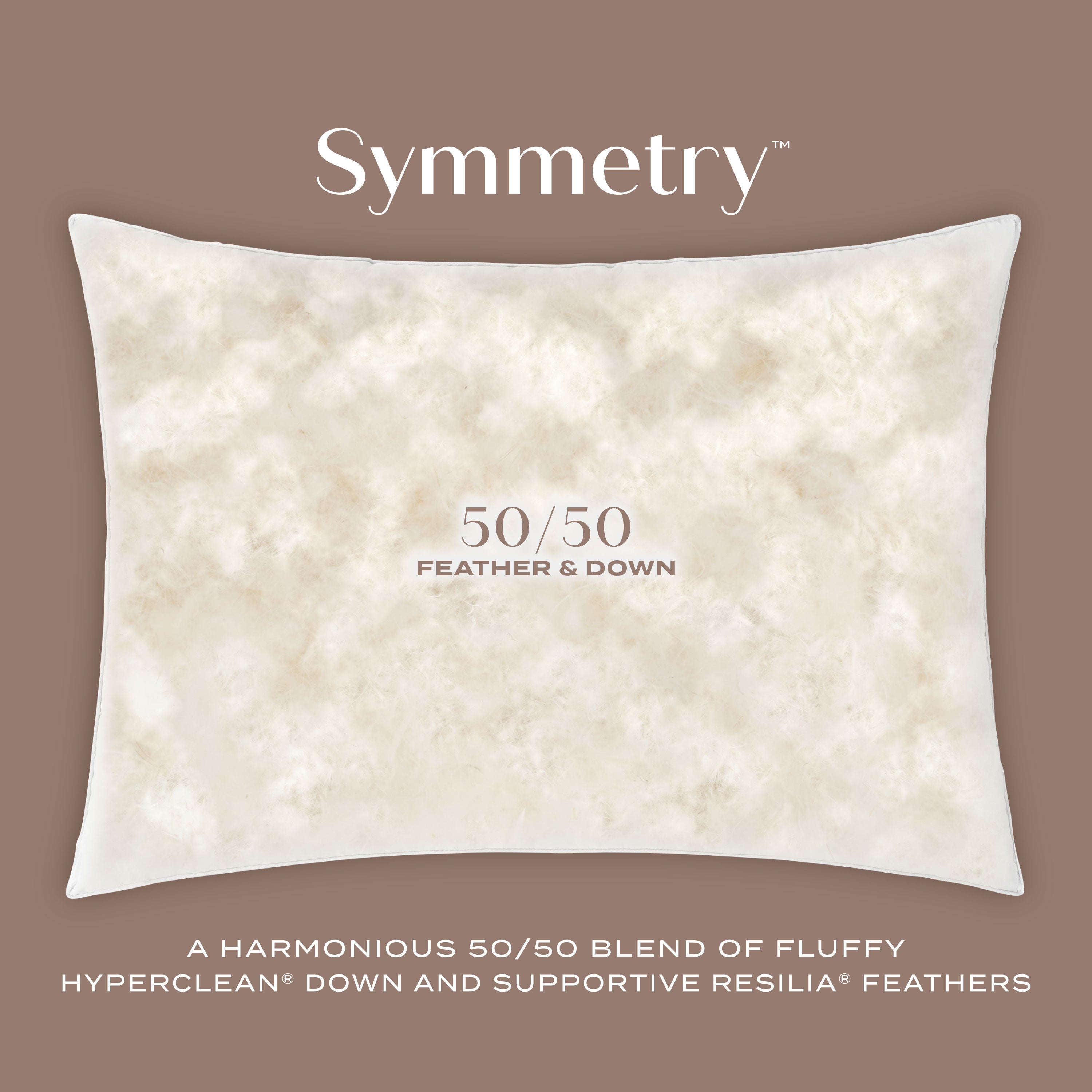 White pillow with 'Symmetry' branding on a brown background